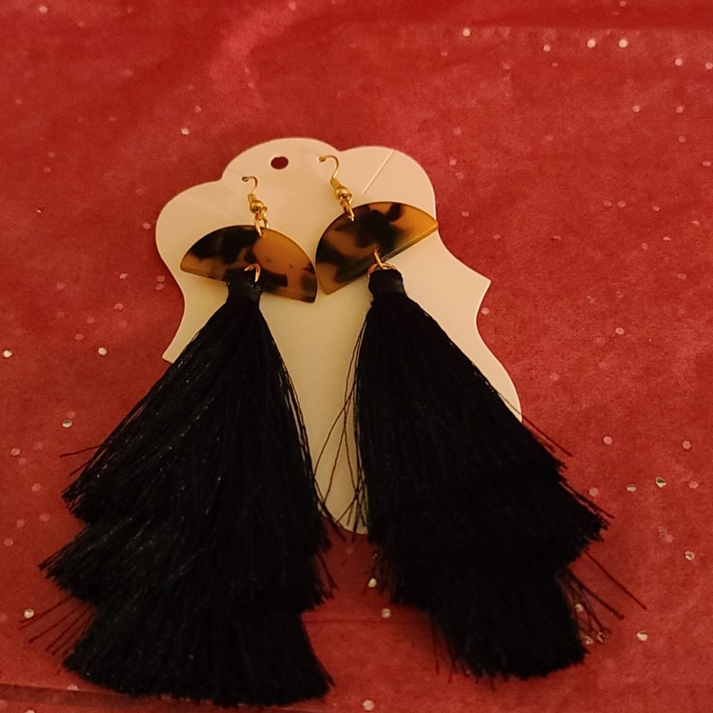 Tortoiseshell earrings with a black tassle